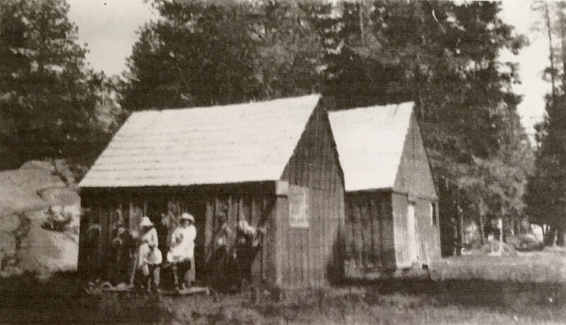 People outside cabins at Rubicon Soda Springs.